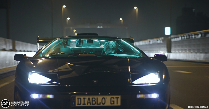 Illustration for article titled Meet A Japanese Gangster And His Flashing Neon Lamborghini